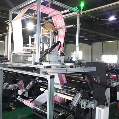 廠家供應包裝袋開線貼標機 濕巾袋打孔貼標機 干濕巾袋開孔貼標機